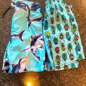 Boy swim trunks sharks& Beatles. Great condition one never worn..